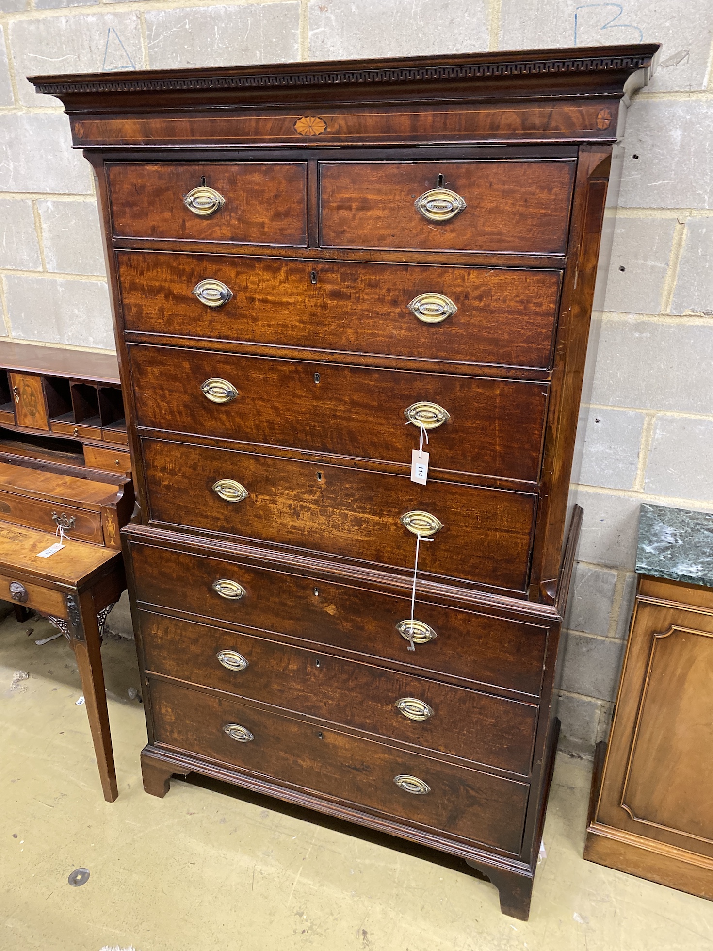 A George III mahogany chest on chest, width 112cm, depth 57cm, height 185cm